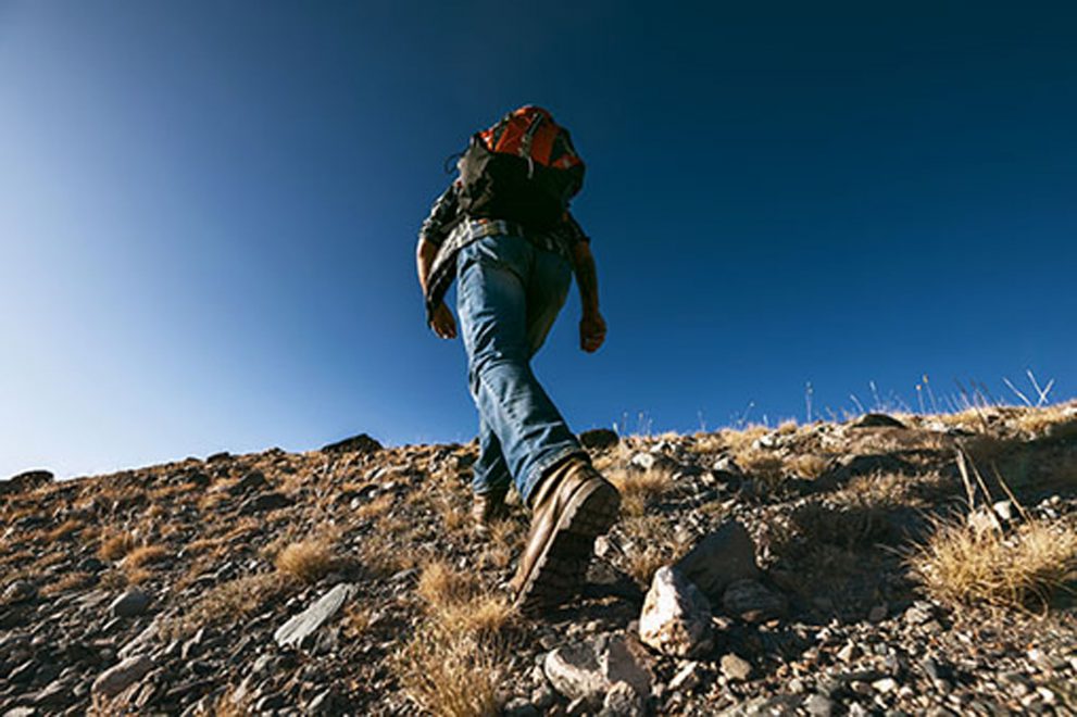 Hiker walking uphill